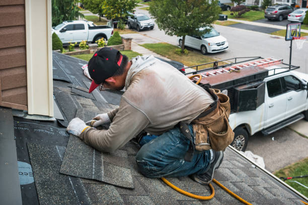 Professional Roofing technician working in Rockland, MA